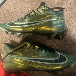 Nike Metallic Green and Black Cleats